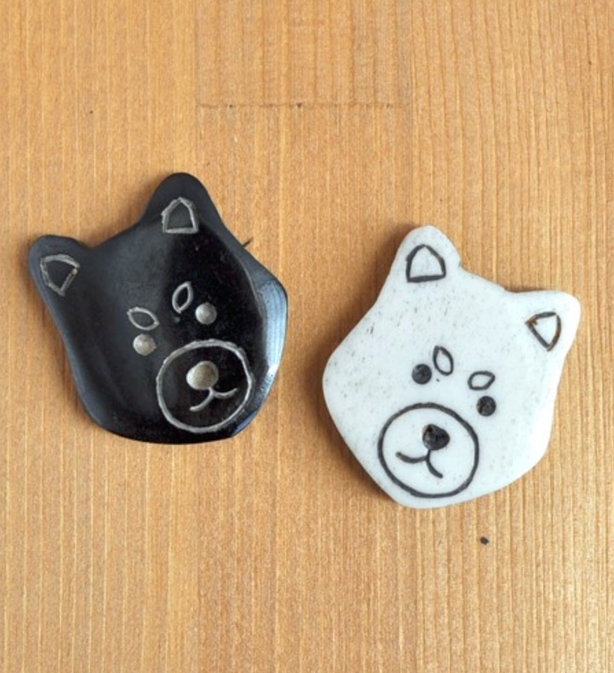 LIVE IN PERFECT UNION Buffalo bone brooch