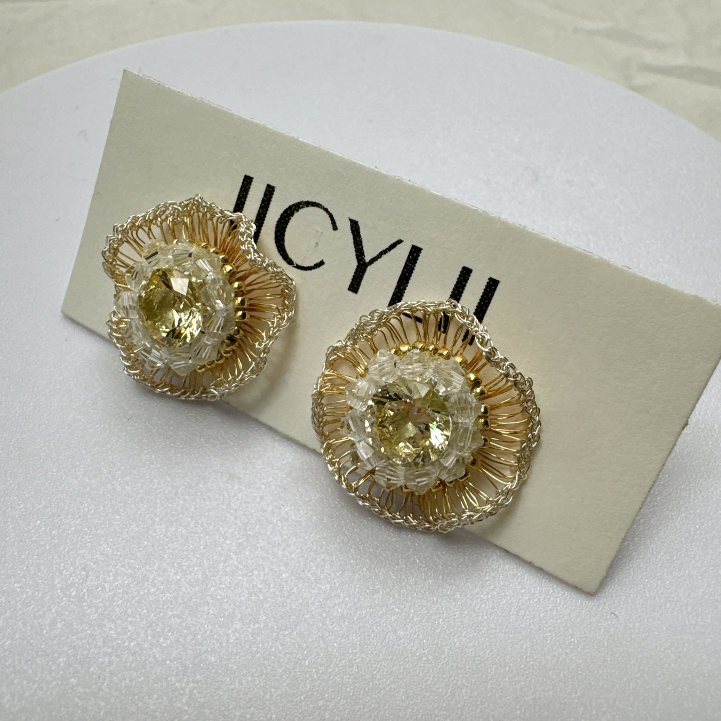 Gold and silver rhinestone earrings
